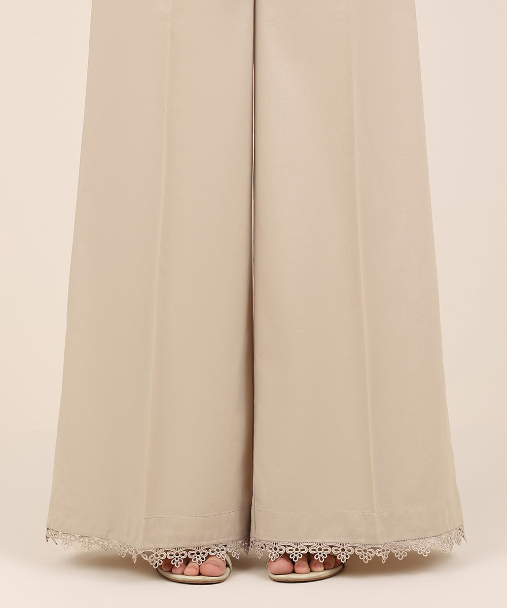 Women's RTW Cambric Beige Solid Flared Pants