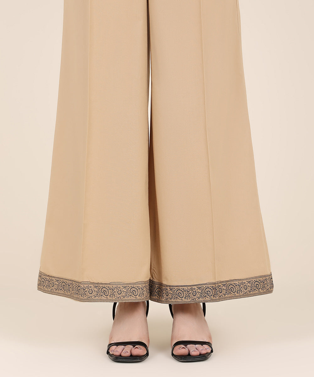 Women's RTW Cambric Beige Solid Flared Pants