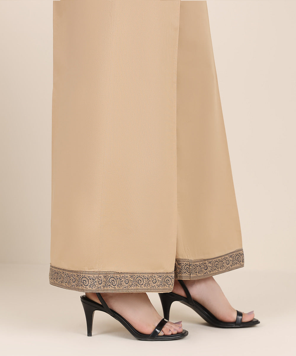 Women's RTW Cambric Beige Solid Flared Pants