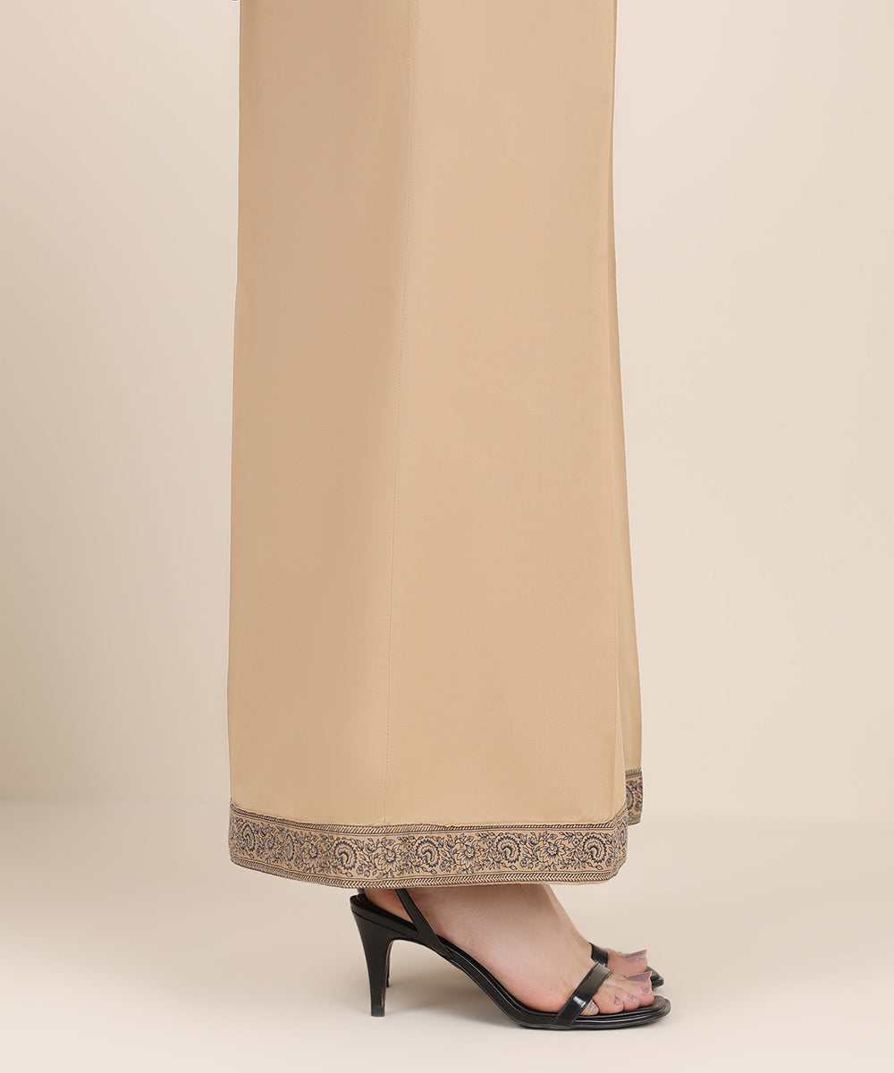 Women's RTW Cambric Beige Solid Flared Pants