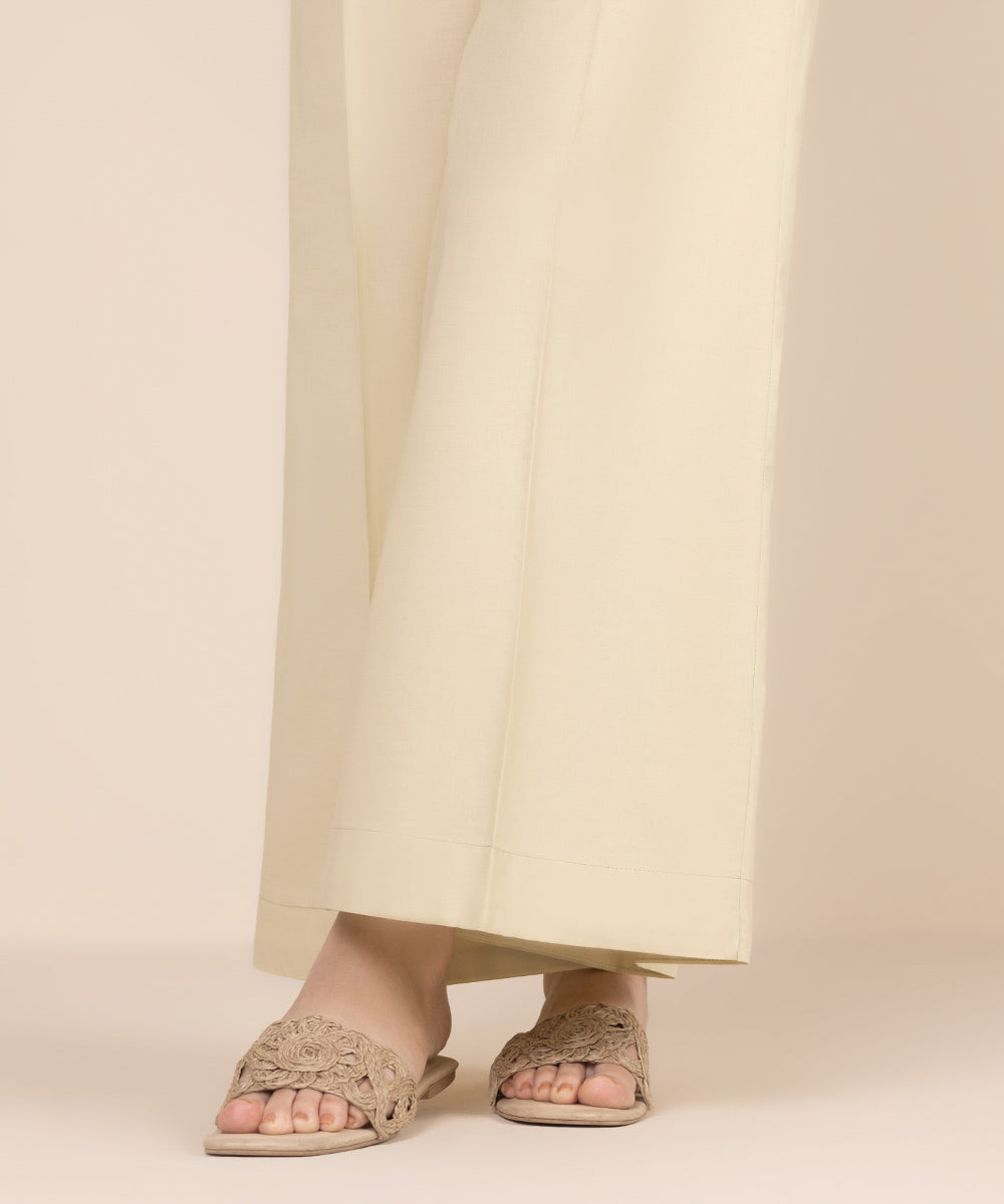 Women's RTW Cambric Beige Solid Flared Pants