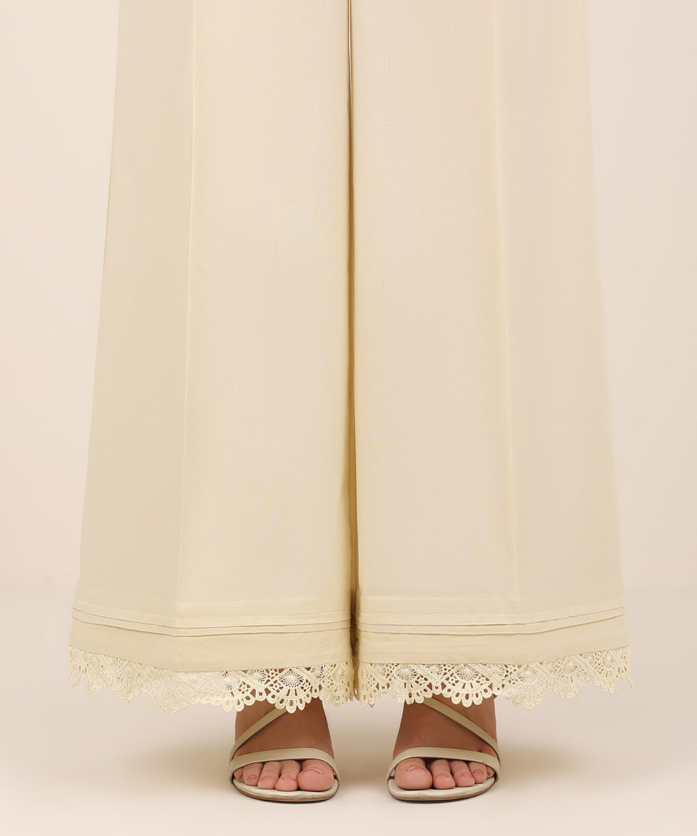 Women's RTW Cambric Beige Solid Flared Pants