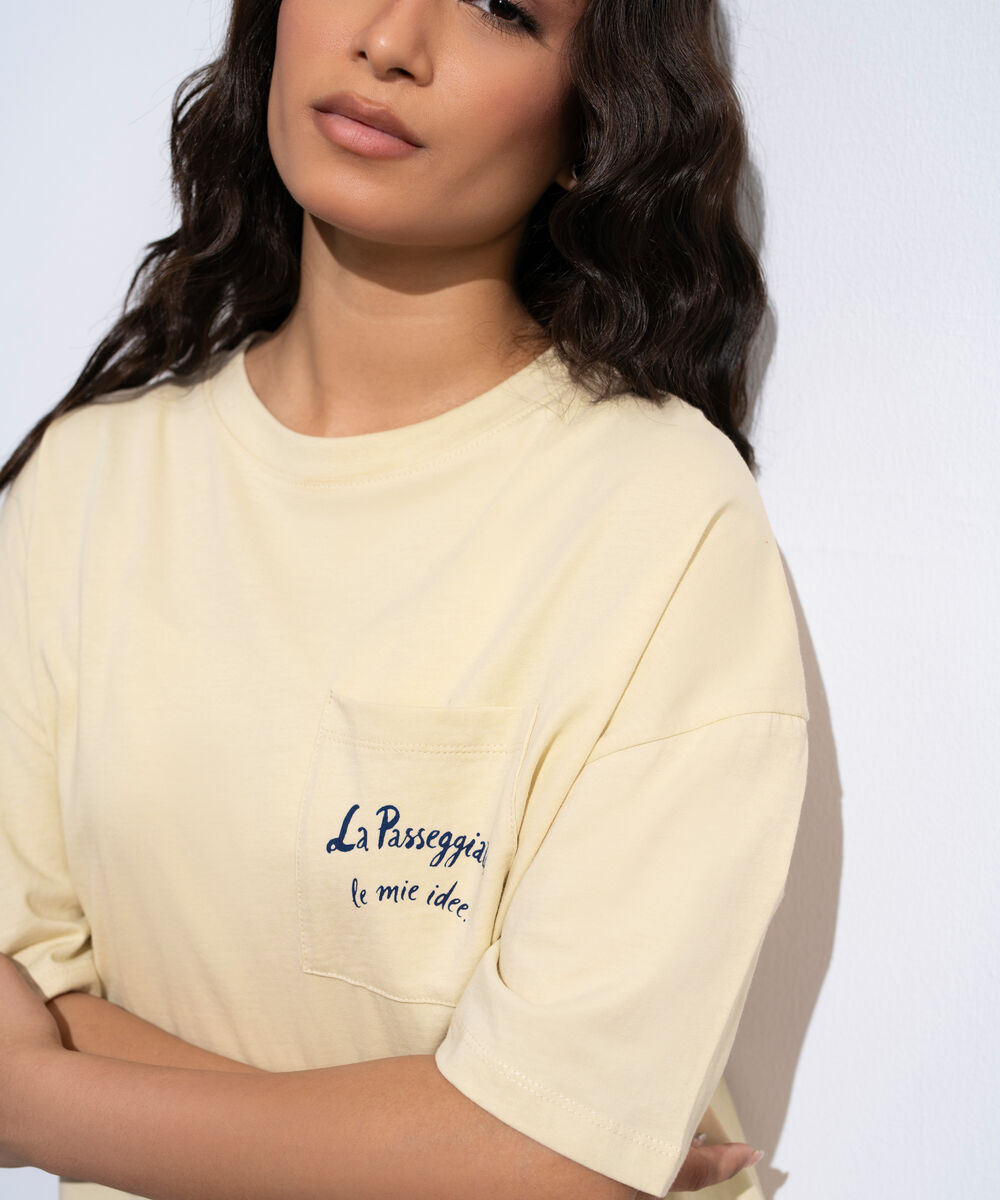 Women's Off-White Loose-Fit Graphic T-Shirt With Pocket