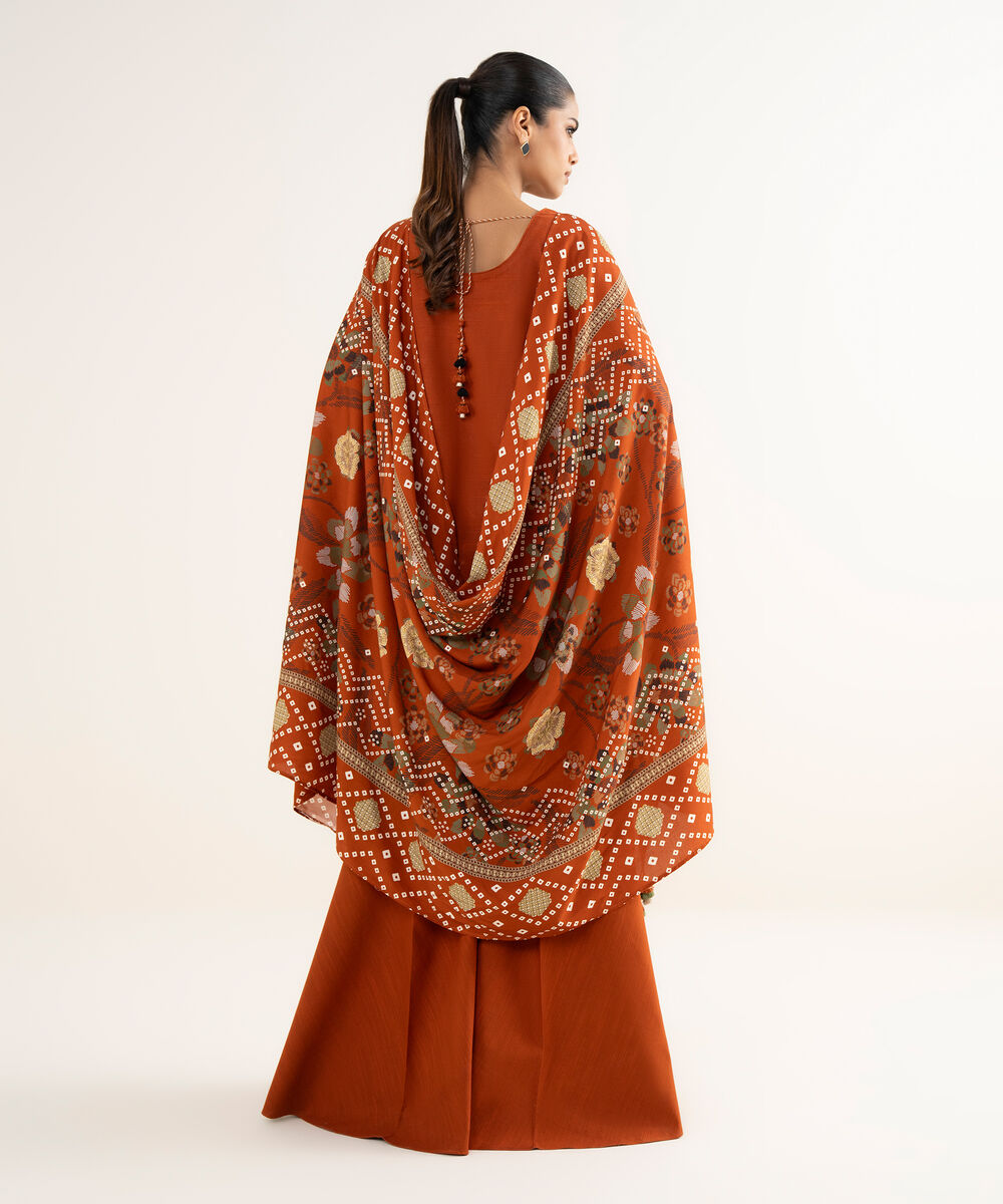 Women's Unstitched Light Khaddar Embroidered Orange 3 Piece Suit