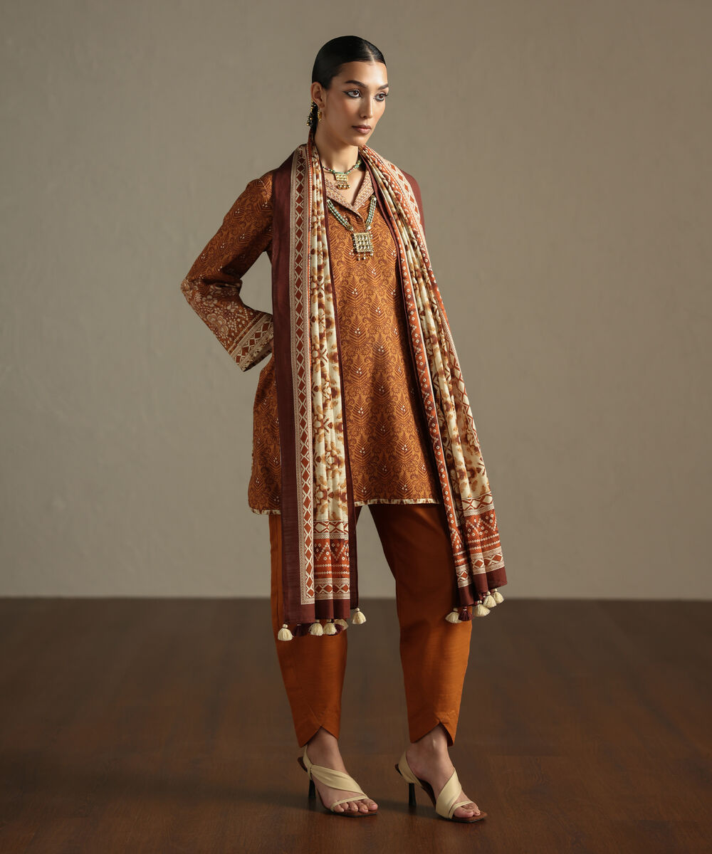 Women's Unstitched Khaddar Printed Orange 3 Piece Suit