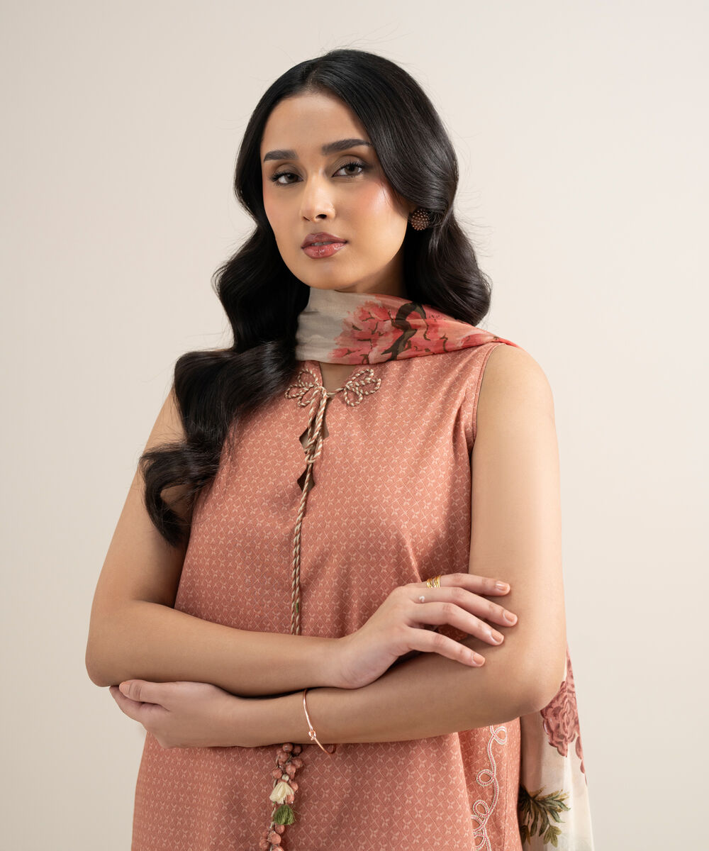 Women's Unstitched Dobby Embroidered Peach 3 Piece Suit
