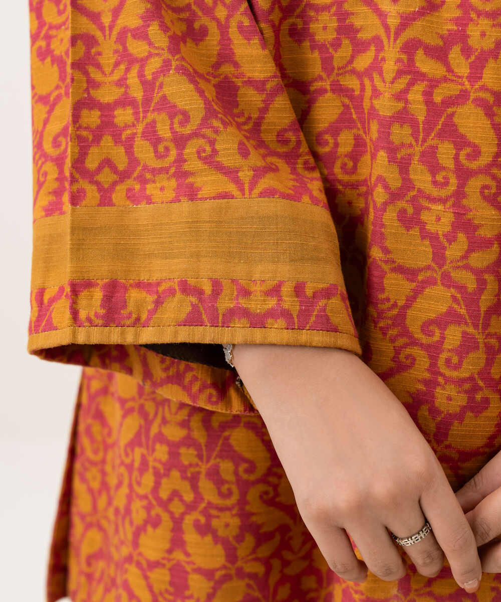 Women's Unstitched Khaddar Printed Orange 2 Piece Suit