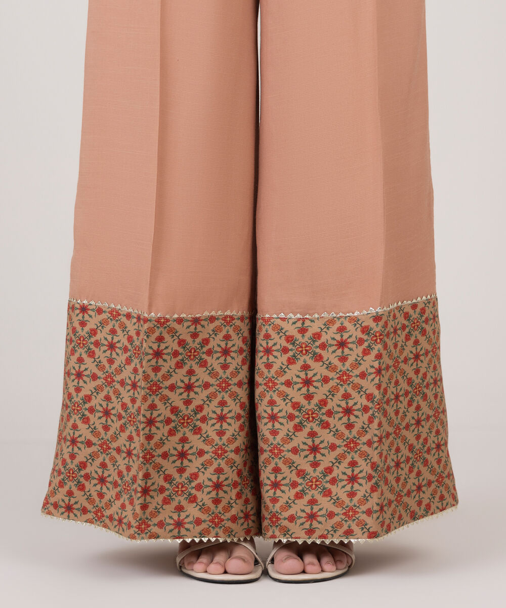 Women's RTW Viscose Raw Silk Pink Solid Flared Pants